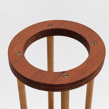 A pair of teak floor lamps, mid 20th Century.