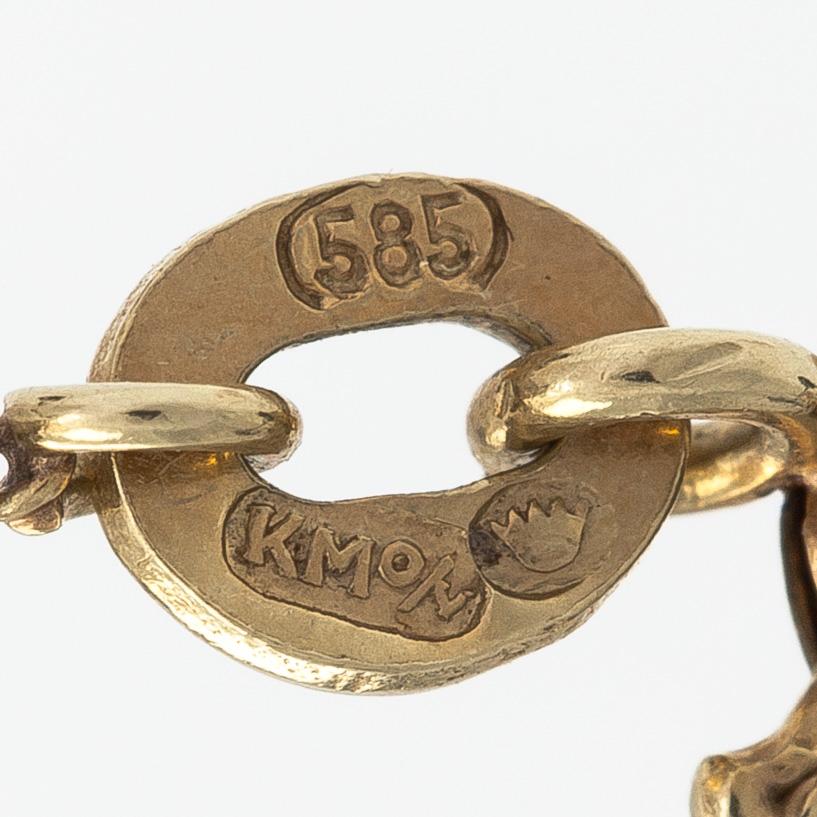 A 14K gold necklace with a synthetic spinel, Kalevi Piirainen, Helsinki 1962.