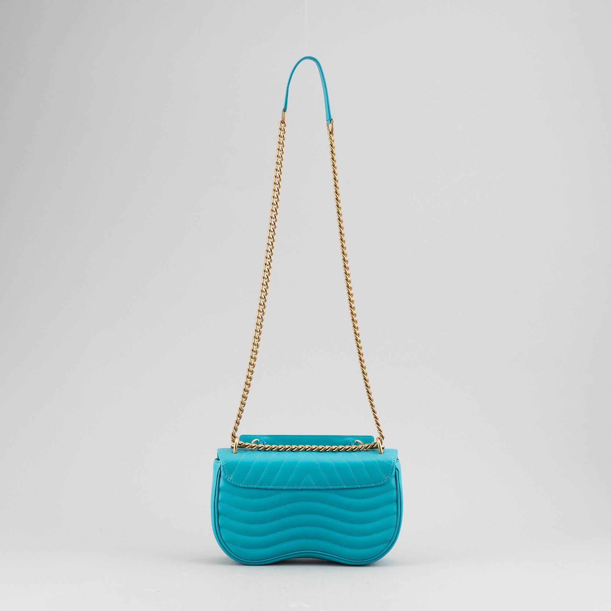 LOUIS VUITTON, "crossbody Wave chain bag".