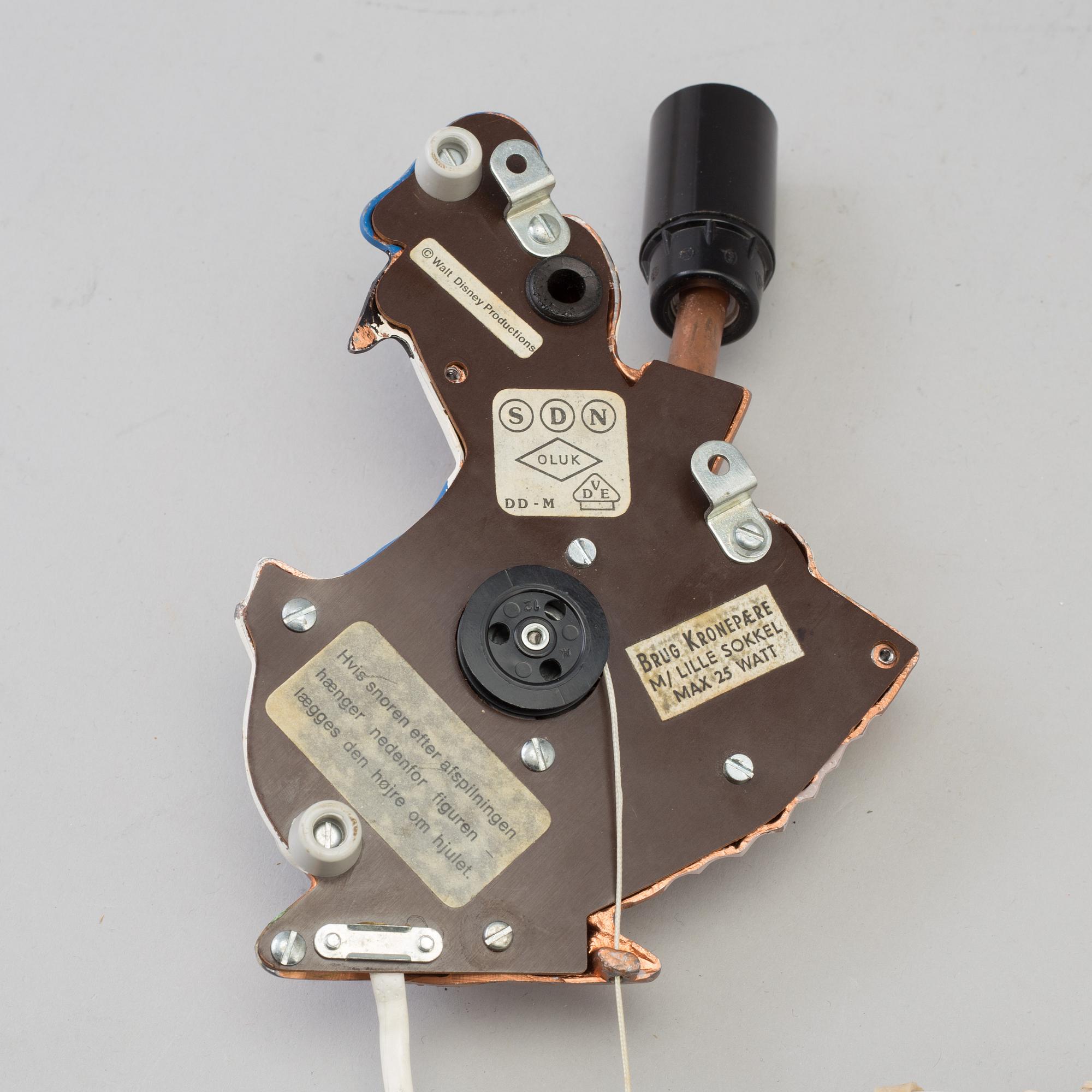 A mid 20th century metal Donald Duck Walt Disney Productions wall light.