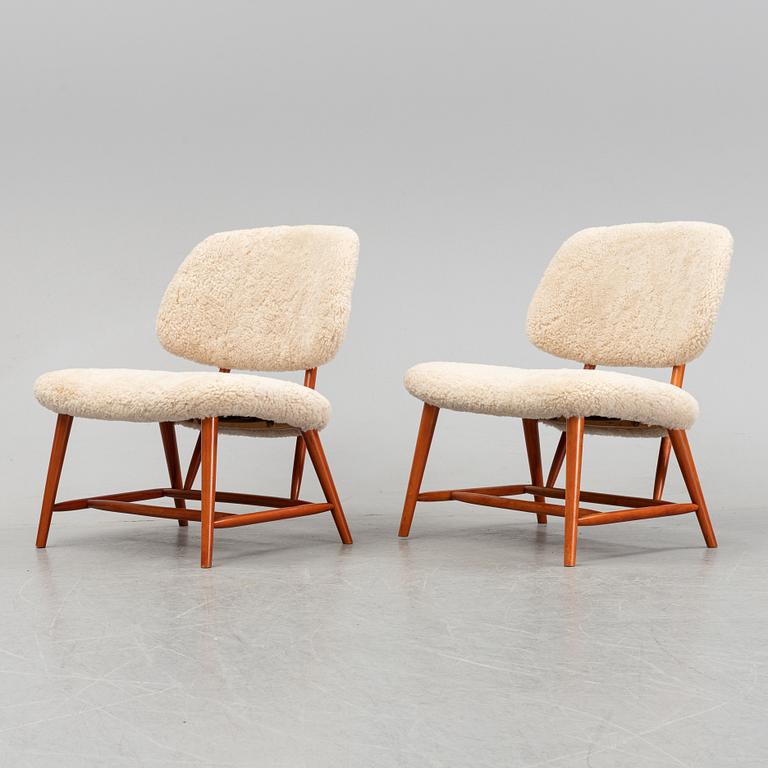 A 1950's pair of 'TeVe' easy chairs by Alf Svensson.