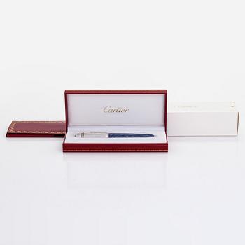 Cartier, a 'Pasha de Cartier Laque Bleu' ballpoint pen.