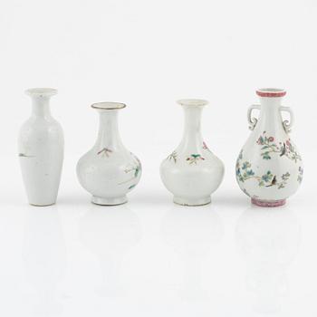 A set of eight Chinese vases, late Qing dynasty/20th Century.