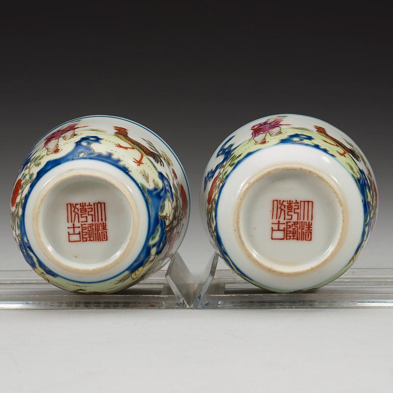 A pair of famille rose rooster cups, China, second half of the 20th century, sealmark in red.