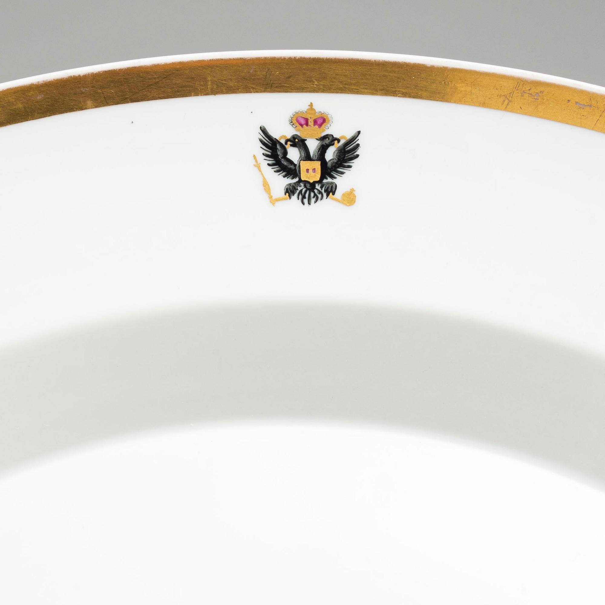 A first half of the 19th century porcelain plate and sauce boat, KPM, Berlin, Germany.