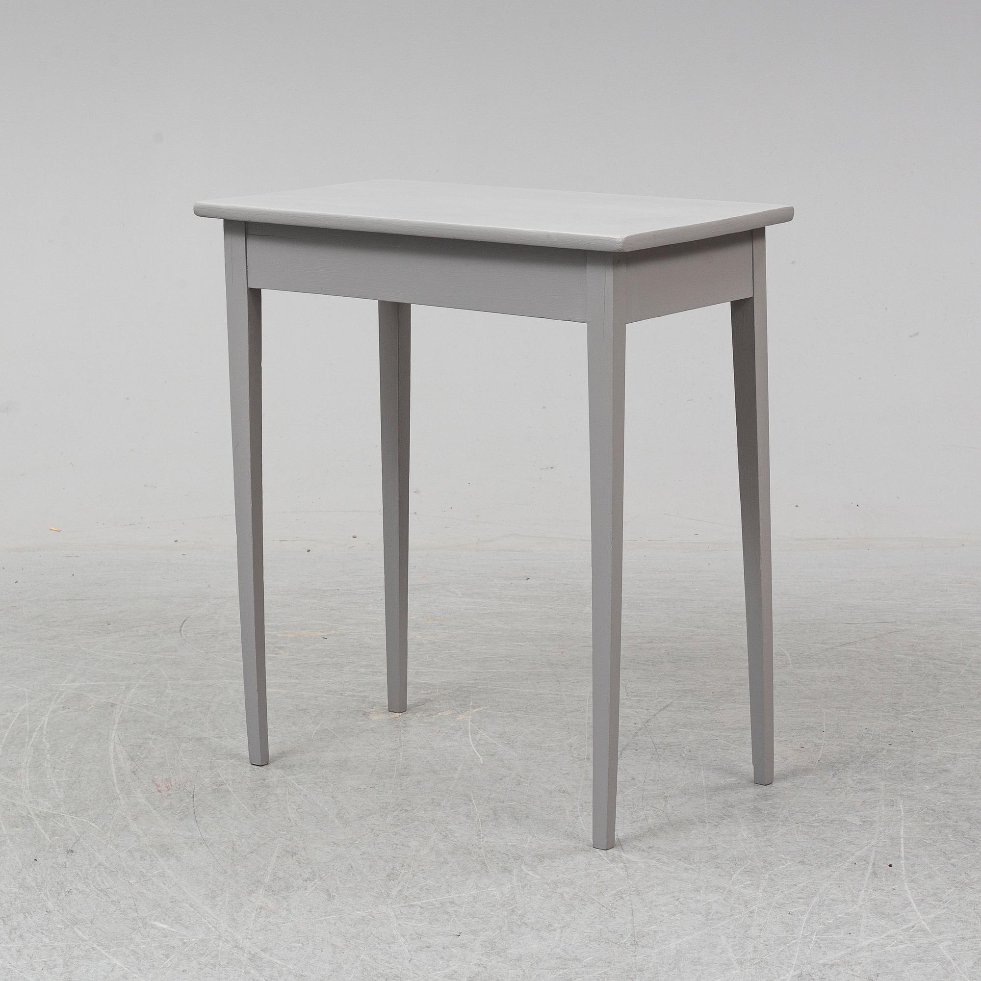 A painted table, 19th Century.