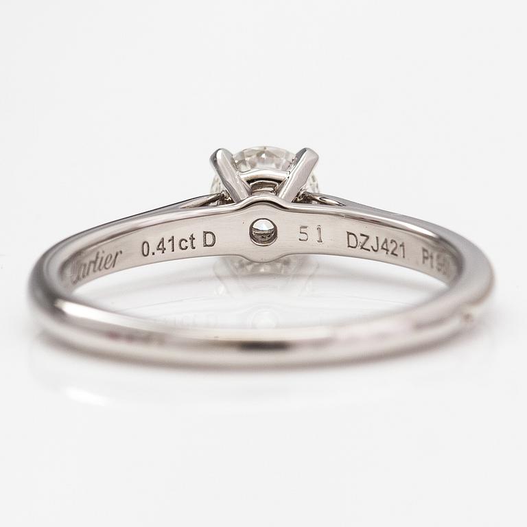 Cartier, A platinum ring with a diamond xa. 0.41 ct. Marked Cartier DZJ421. GIA certificate.