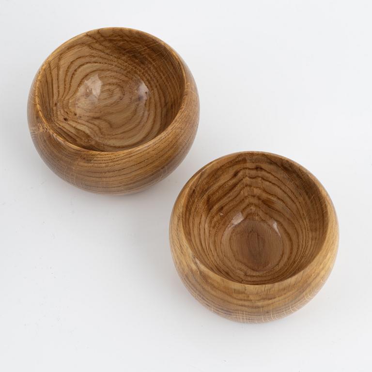 Magnus Ek, a set of eight oak wood bowls for Oaxen Krog, 2019.