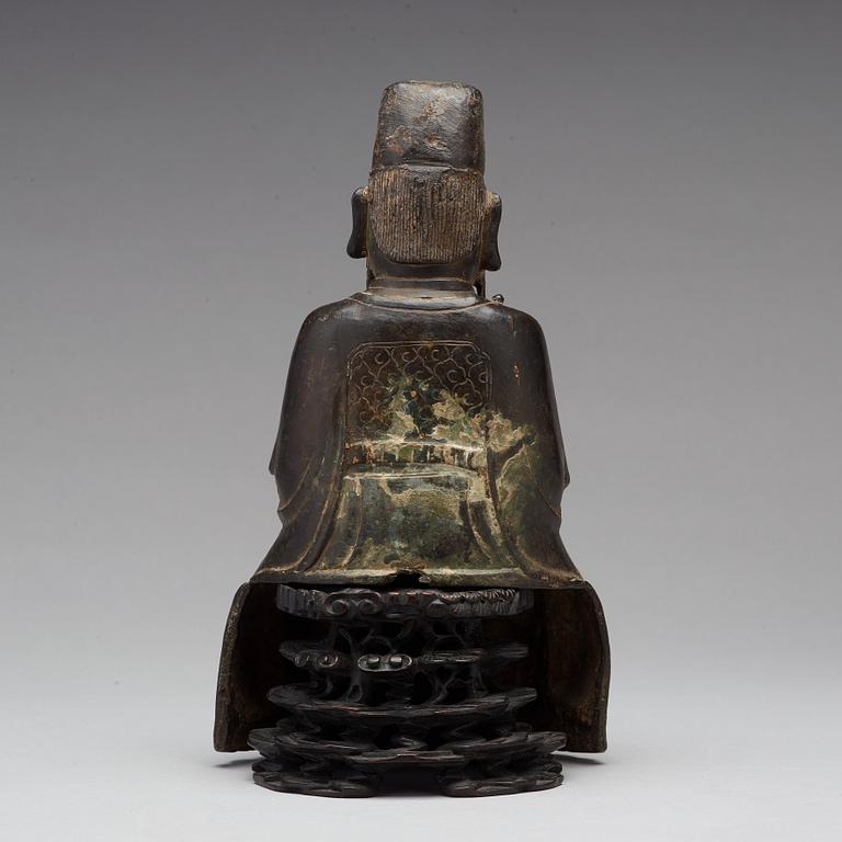 A bronze sculpture of a daoist dignitary, Ming dynasty (1368-1644).