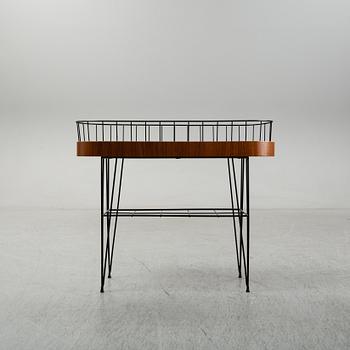 A 1950-60s plant stand.