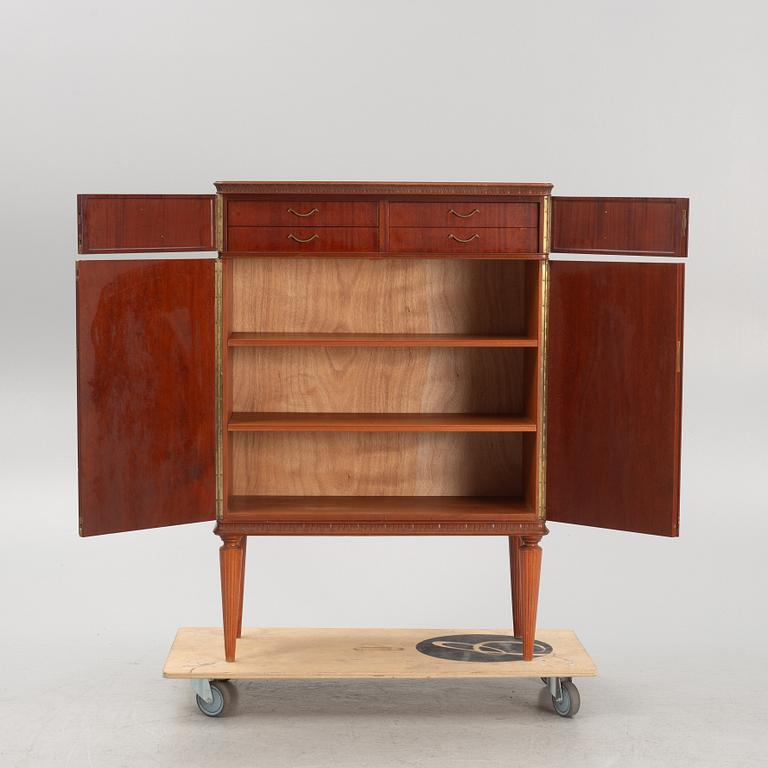 A cabinet, mid 20th Century.