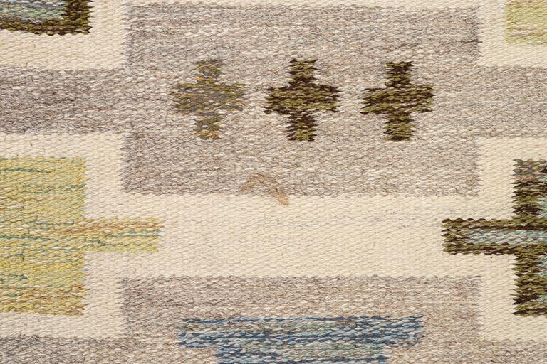 A, flat weave rug, signed JLH (Jönköping County Handicrafts), approx. 242 x 172 cm.