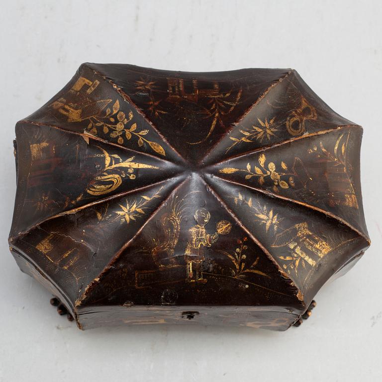 A Chinese tin case in a wooden box, early 20th century.