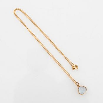 Necklace 18K gold with cabochon-cut blue glass.