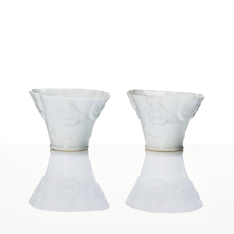 A pair of blanc de chine libation cups, Qing dynasty, 19th Century.