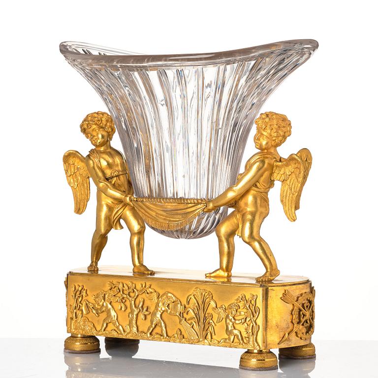 An Empire gilded bronze and glass centre piece, first part of the 19th century.