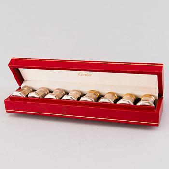 CARTIER, A set of eight sterling silver salt and pepper shakers in original Cartier box.