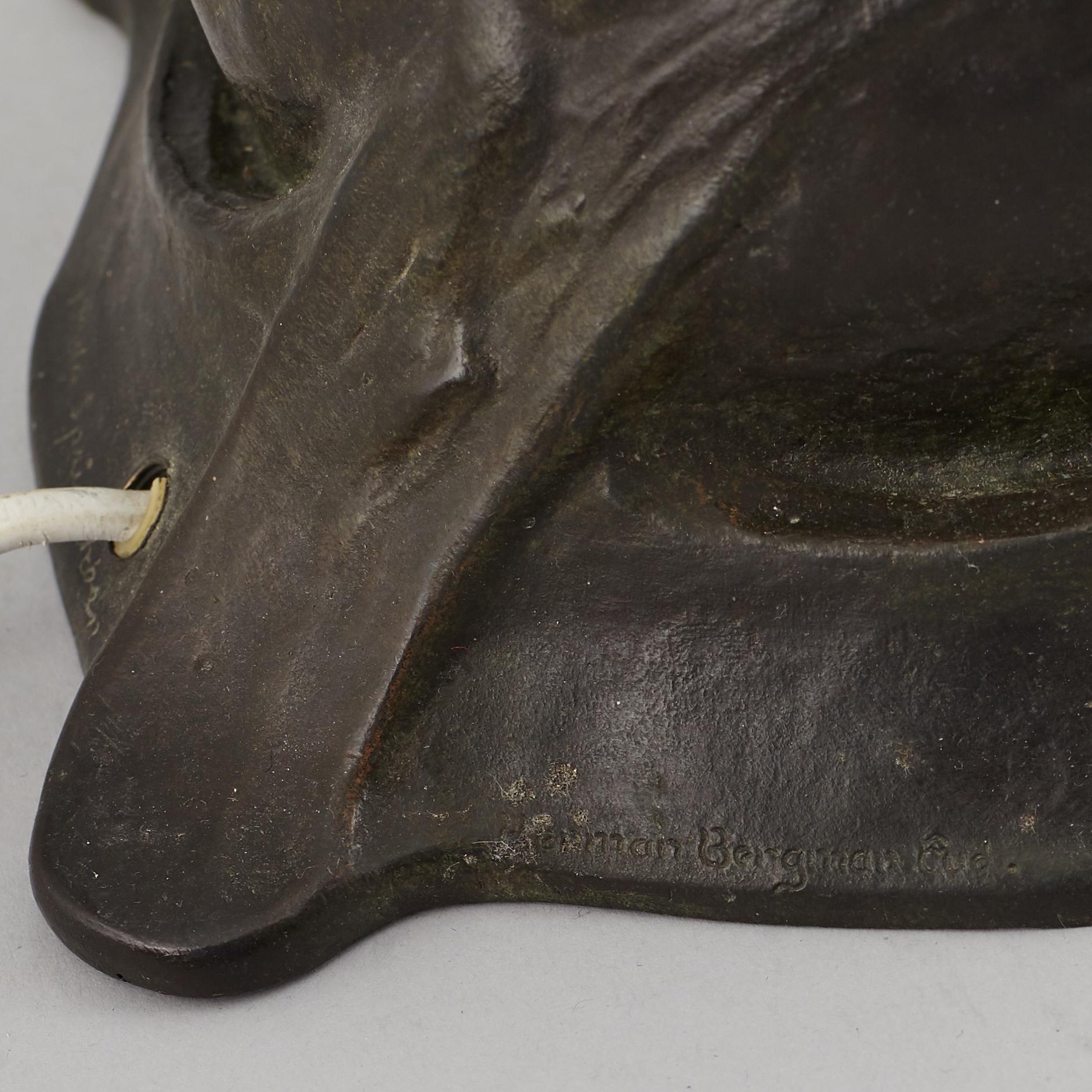 GERDA SPRINCHORN, an Art Nouveau green patinated bronze lamp "The Sun", Herman Bergman, Stockholm, early 20th century.