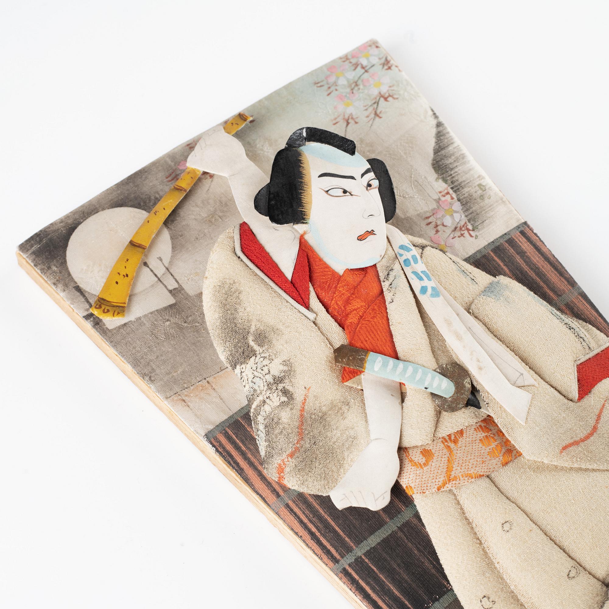 A set of two Japanese hagoita wooden paddles and five shuttlecocks, first part of 20th century.