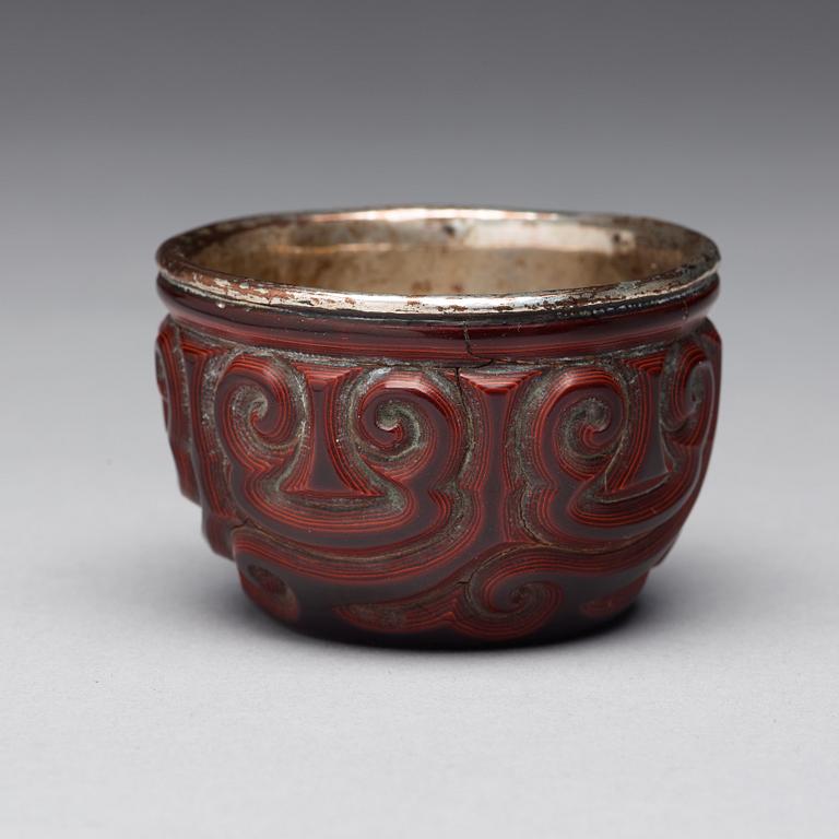 A 'Guri' lacquer silver mounted cup, Qing dynasty, 18th Century or older.