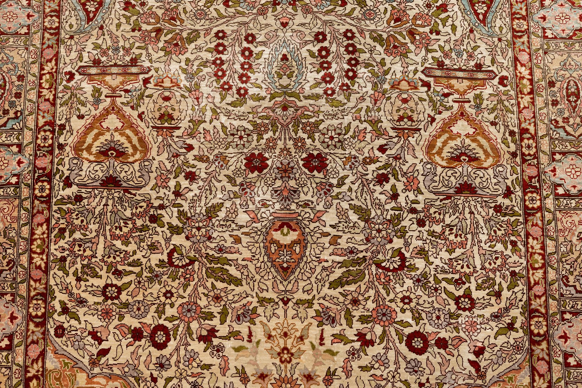 A rug, Old silk Hereke, ca 152 x 110 cm.