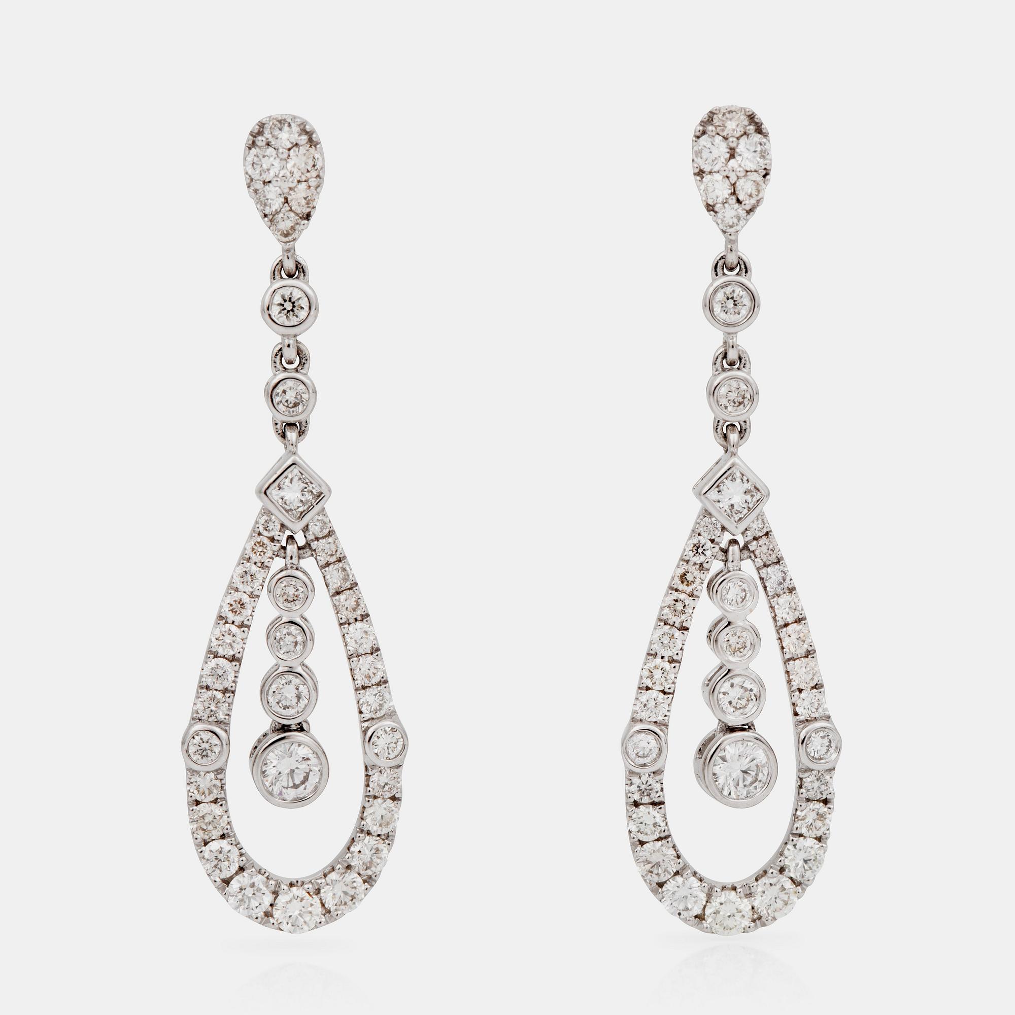 A pair of diamond earrings, 1.58 cts in total.