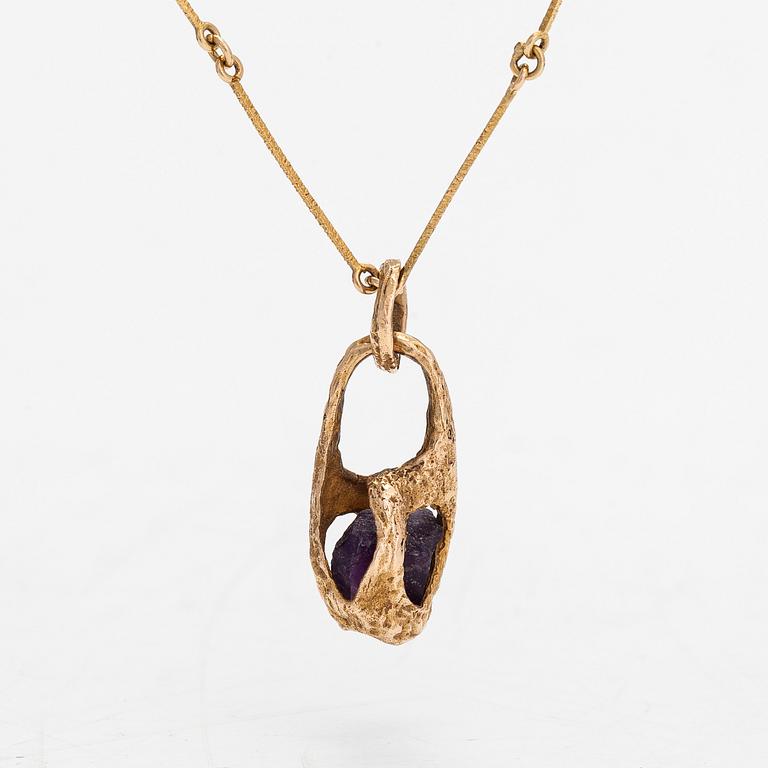 Björn Weckström, halsband, "Renklockan", 14K guld och ametist, Lapponia 1974.