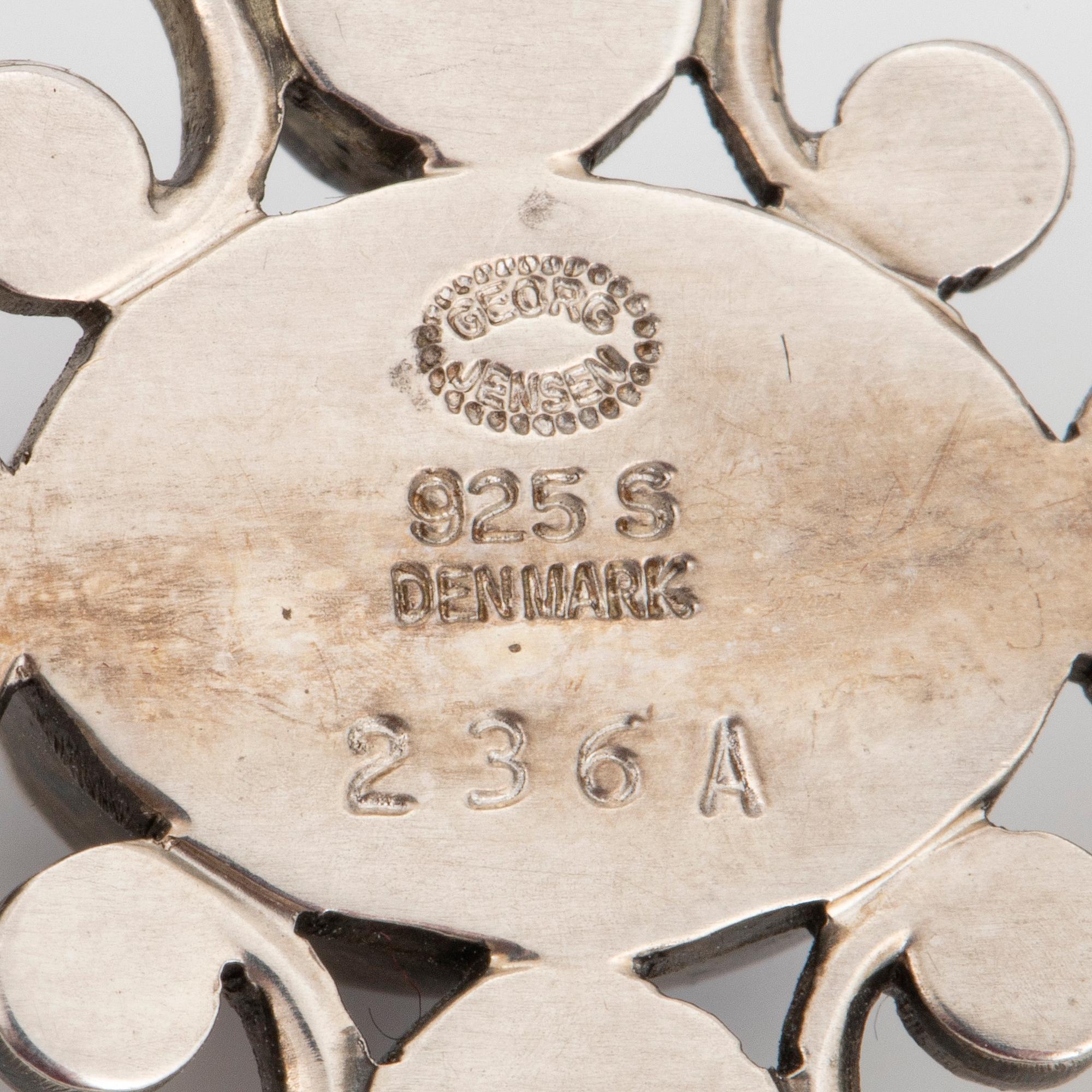 A Georg Jensen brooch 236A silver set with lapis lazuli.