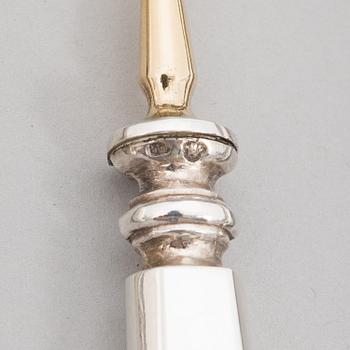 A 42-piece set of silver cutlery with seashell decorated handles, Finnish hallmarks, 1918-1950.