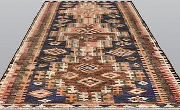 A kurdish kilim carpet, 310 x 190 cm.