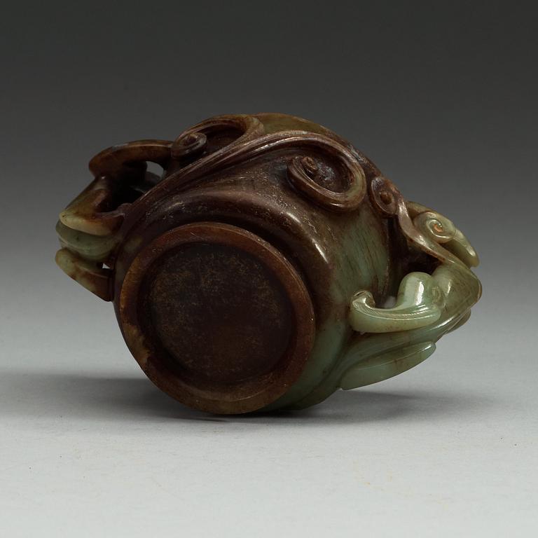 A Chinese nephrite cup with handles.