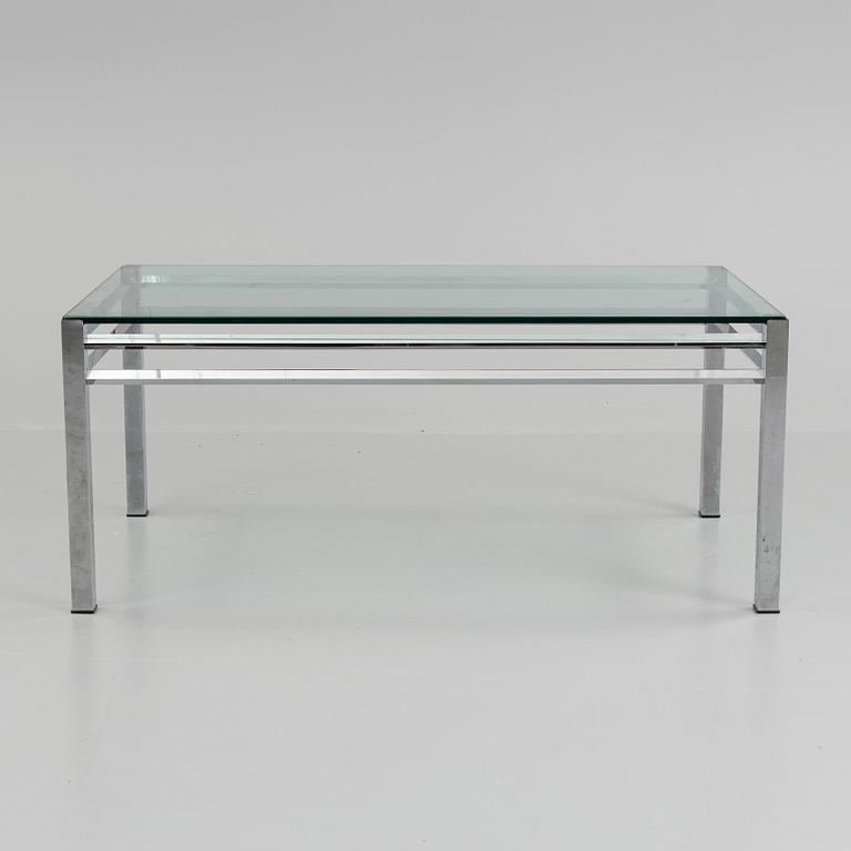 A 1980´s metal table with glass top.