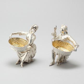 A pair of silver figurines bought at Garrard, London, 21th century.