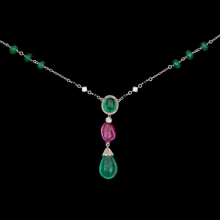An onyx, emerald, 0.30 ct diamond and 4.65 ct untreated ruby necklace.