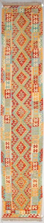 A RUNNER, an Oriental Kilim, ca 421,5 x 80,5 cm.