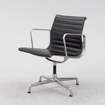 An EA 108 swivel office chair by Charles and Ray Eames for Vitra.