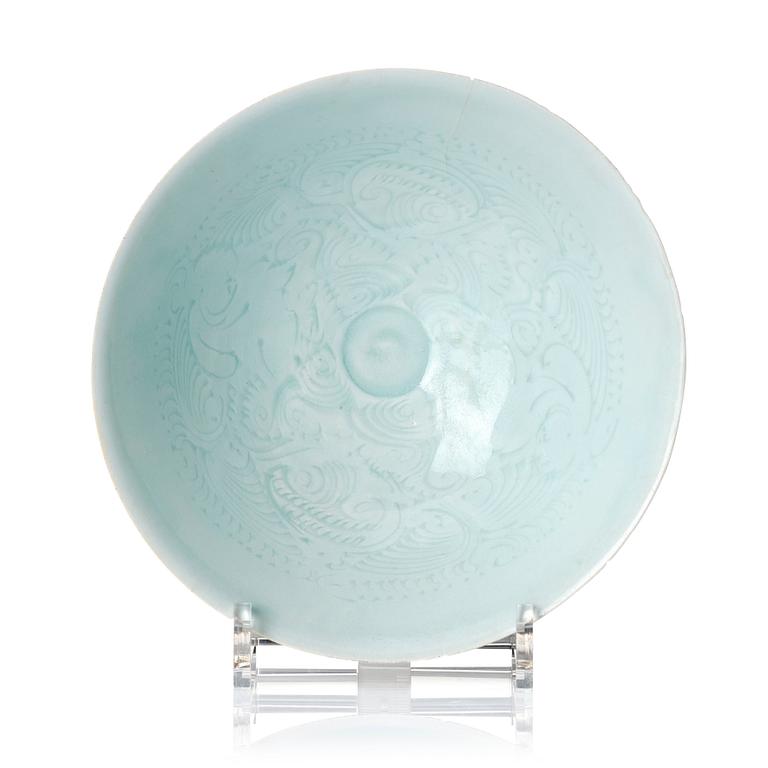 A carved qingbai 'boys' bowl, Song dynasty (960-1279).