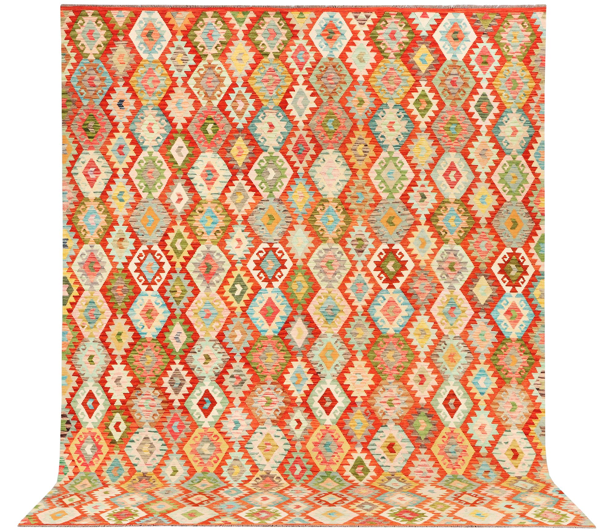 A Kilim carpet, c. 396 x 307 cm.