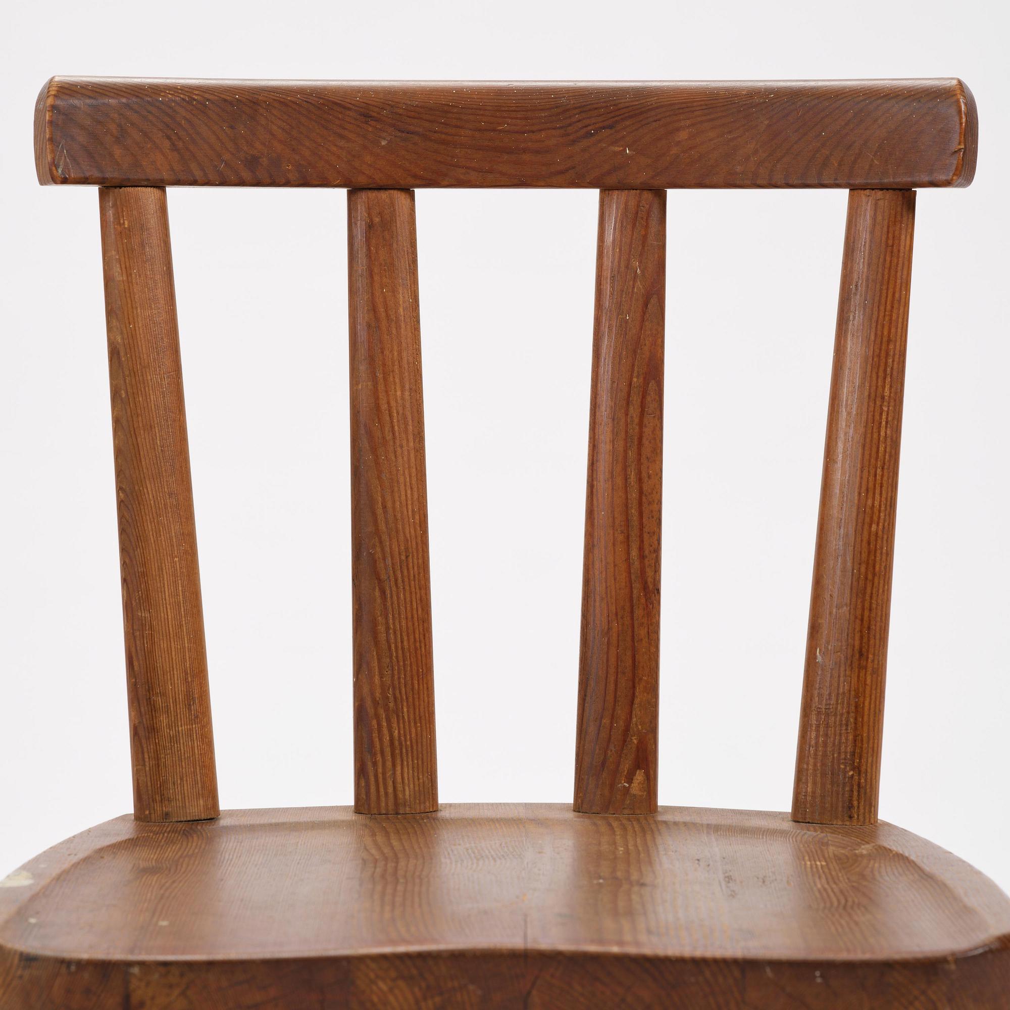 Axel Einar Hjorth, a set of three stained pine "Utö" chairs, Nordiska Kompaniet, Sweden, 1930s.
