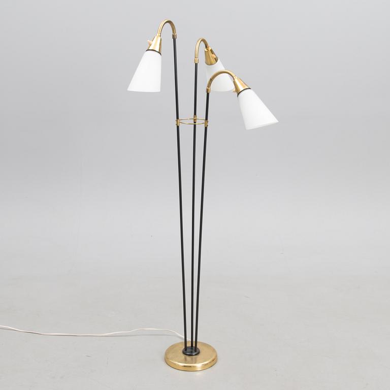 A mid 20th century floor lamp, marked AJH.7.
