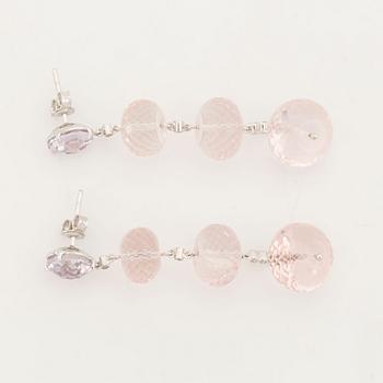 Briolette cut rose quartz and brilliant cut diamond earrings.