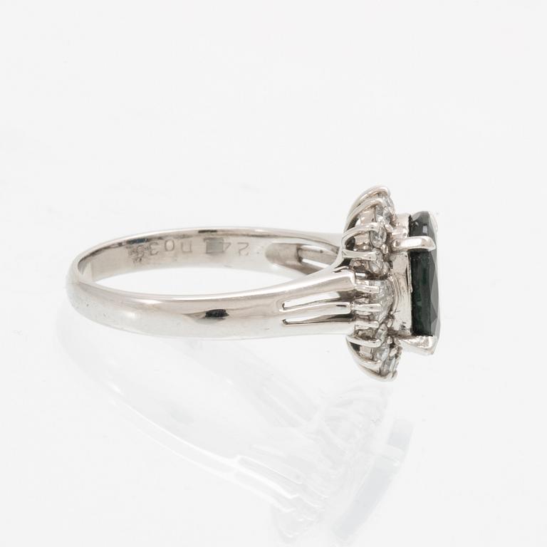 Ring, Platinum 850 with brilliant and tapered baguette cut diamonds and an oval faceted sapphire.