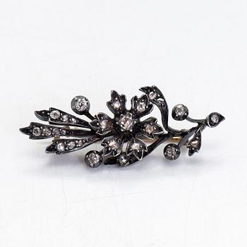 Brooch, silver and gold with rose-cut diamonds.