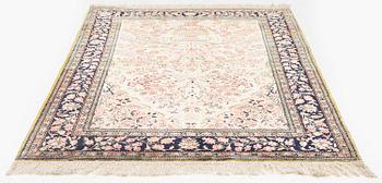 A silk Qum rug, c. 156 x 101 cm.
