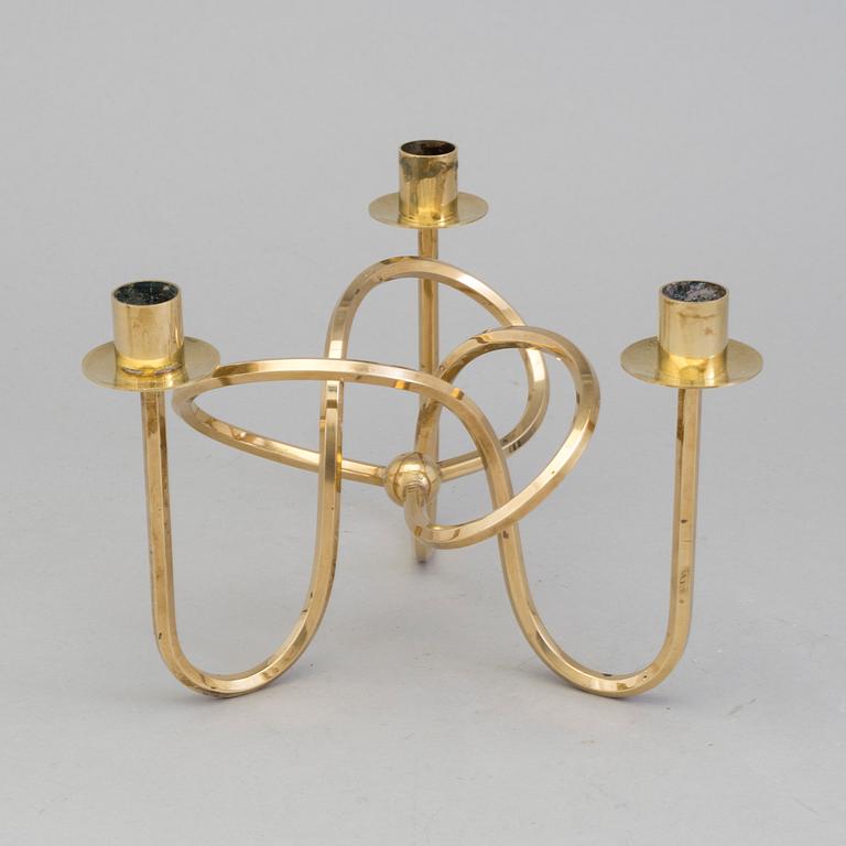 A brass candleholder "The knot of Friendship"design Josef Frank for Svenskt Tenn, Stockholm.
