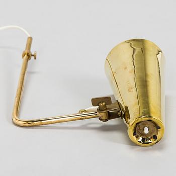 Paavo Tynell, a brass wall light model 9459, Idman, Finland 1960s.