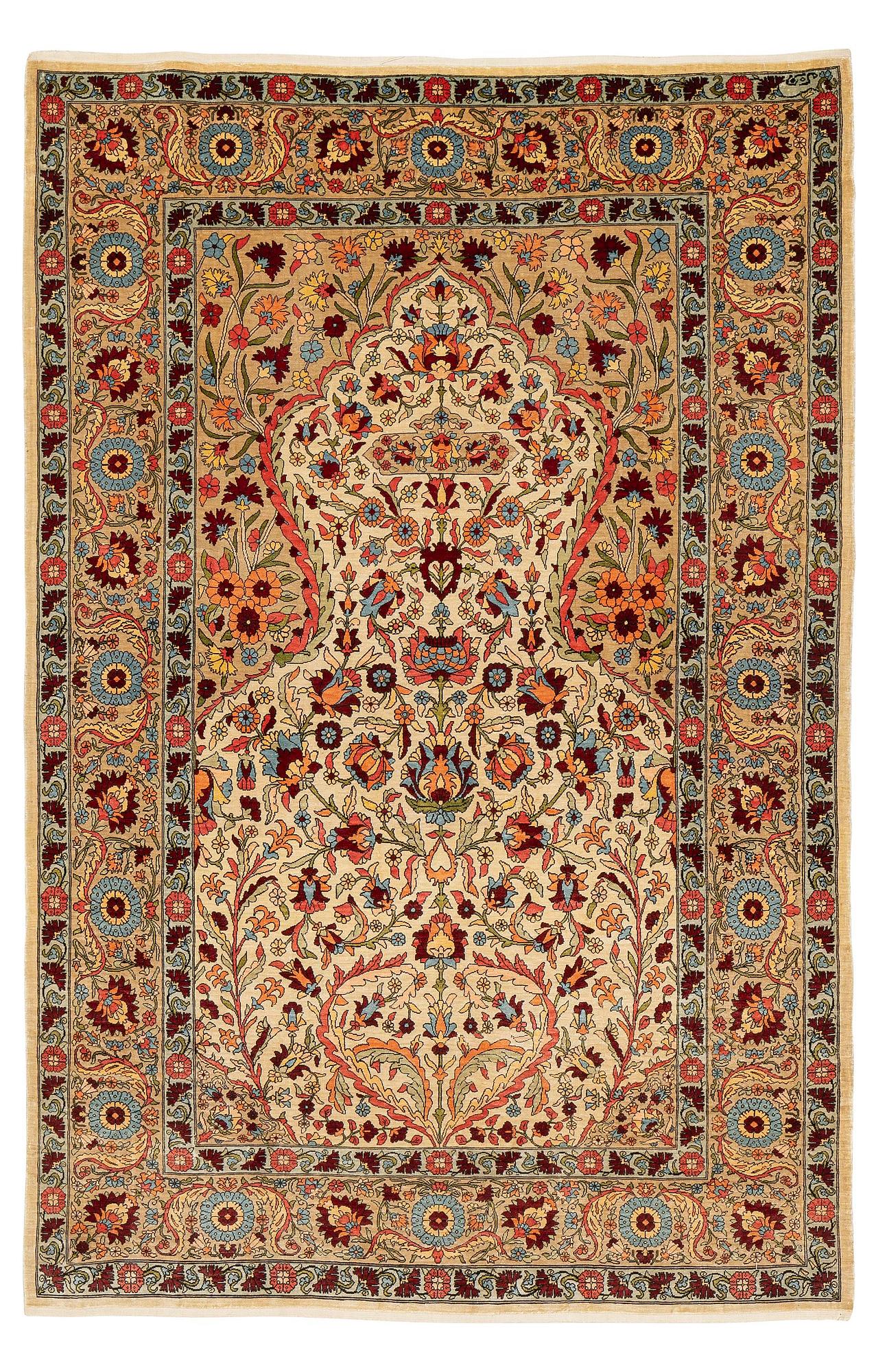 A semi-antique silk Hereke rug, c. 155 x 103 cm.