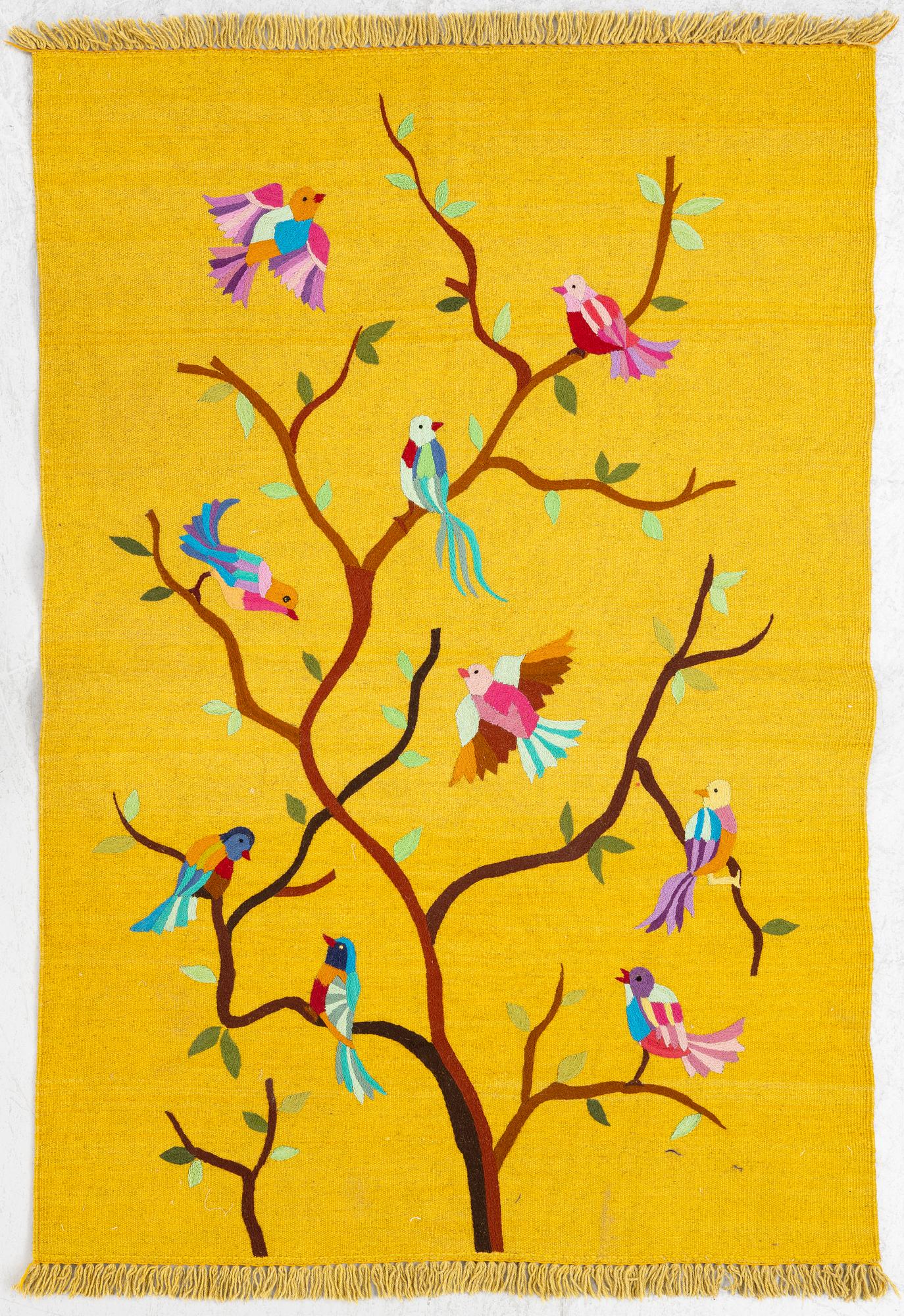 A hand-embroidered Kelim rug, c. 178 x 122 cm.