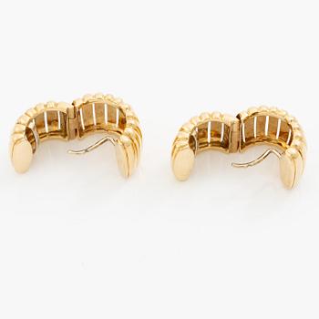Ett par örhängen 18K guld.