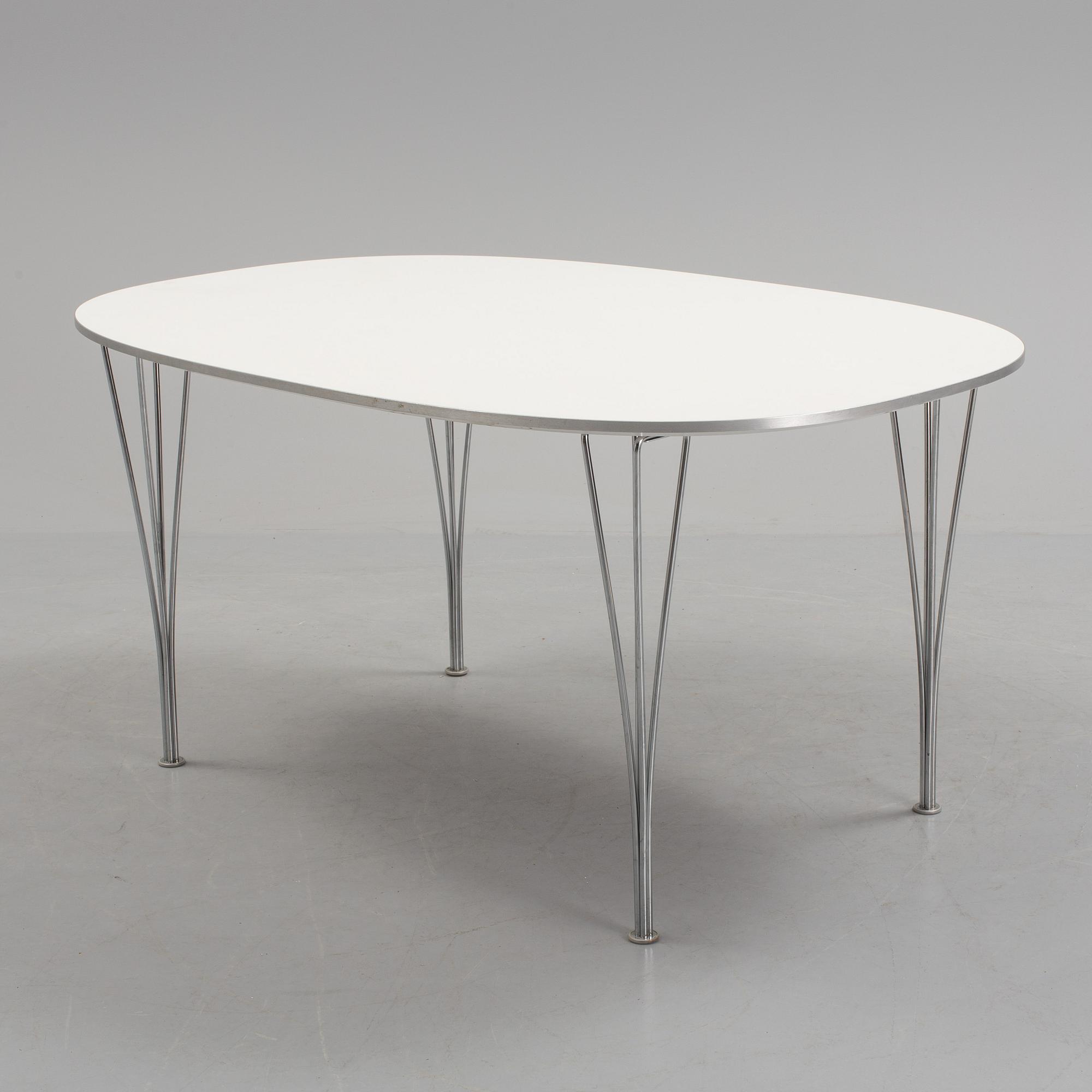 BRUNO MATHSSON AND PIET HEIN, a 'Superellips' dining table from Fritz Hansen, 2005.